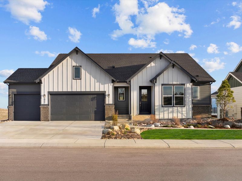 Front exterior of a new home in Jackson Creek, Monument, CO, highlighting curb appeal (Image 1).