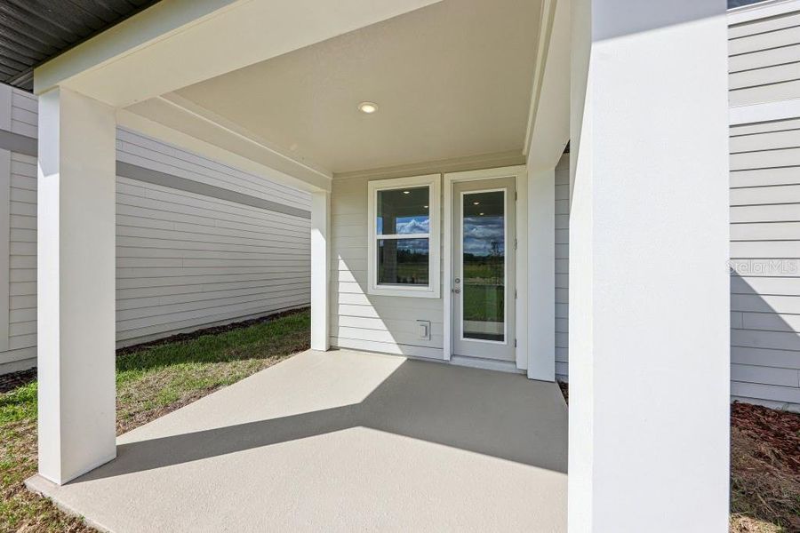 Exterior details and patio area of a home in Trailside, Mount Dora (Image 27). Exterior details and patio area of a home in Trailside, Mount Dora (Image 27).