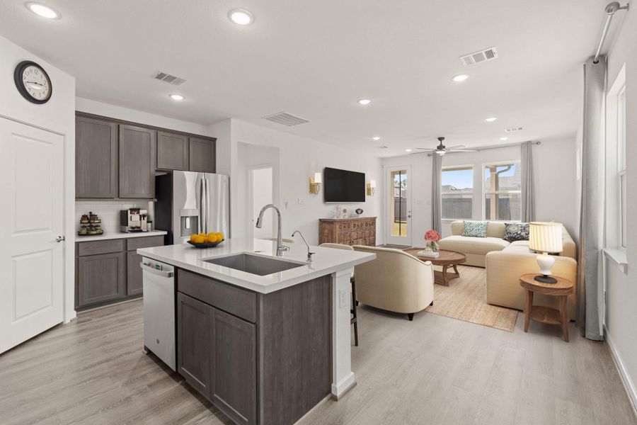 Step into this beautifully designed open-concept home! The open flow connects the kitchen and living area, making it ideal for those who appreciate refined, modern living with a timeless touch. *This photo has been virtually staged