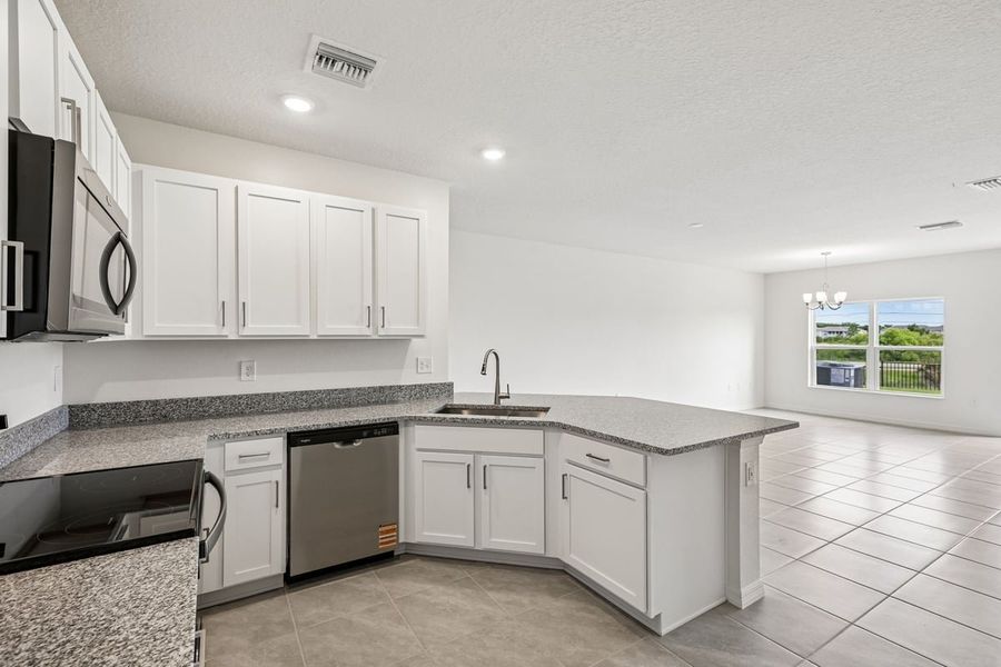 Furnished interior view inside a new home in Reserve at Forest Lake Townhomes, Lake Wales (Image 8). Furnished interior view inside a new home in Reserve at Forest Lake Townhomes, Lake Wales (Image 8).