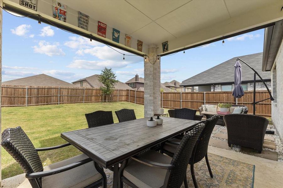 Exterior details and patio area of a home in DeBerry Reserve, Royse City (Image 23). Exterior details and patio area of a home in DeBerry Reserve, Royse City (Image 23).