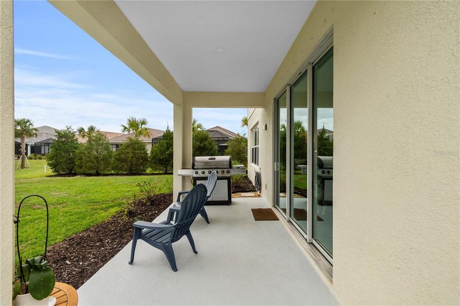 Exterior details and patio area of a home in , Sarasota (Image 36).