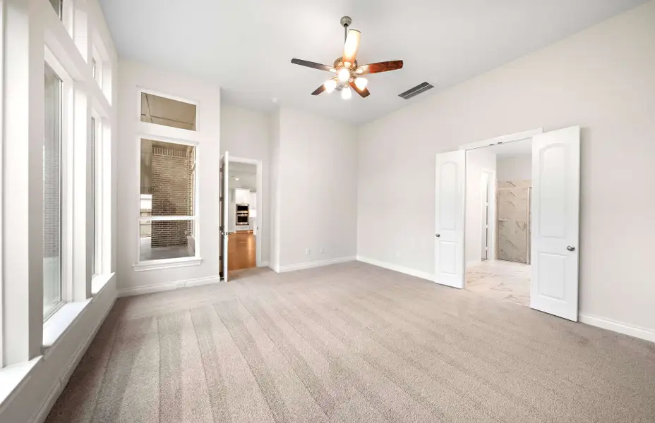 Representative unfurnished interior of a home built from the 3068 by Ravenna Homes in The Woodlands Hills 65′, Willis (Image 38).