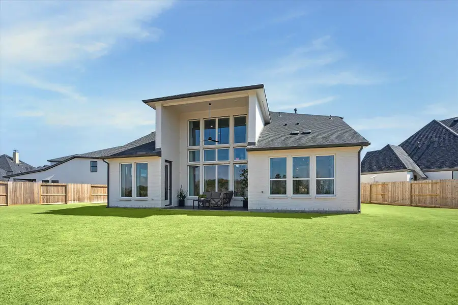 Exterior details and patio area of a home in Cross Creek West, Fulshear (Image 2). Exterior details and patio area of a home in Cross Creek West, Fulshear (Image 2).