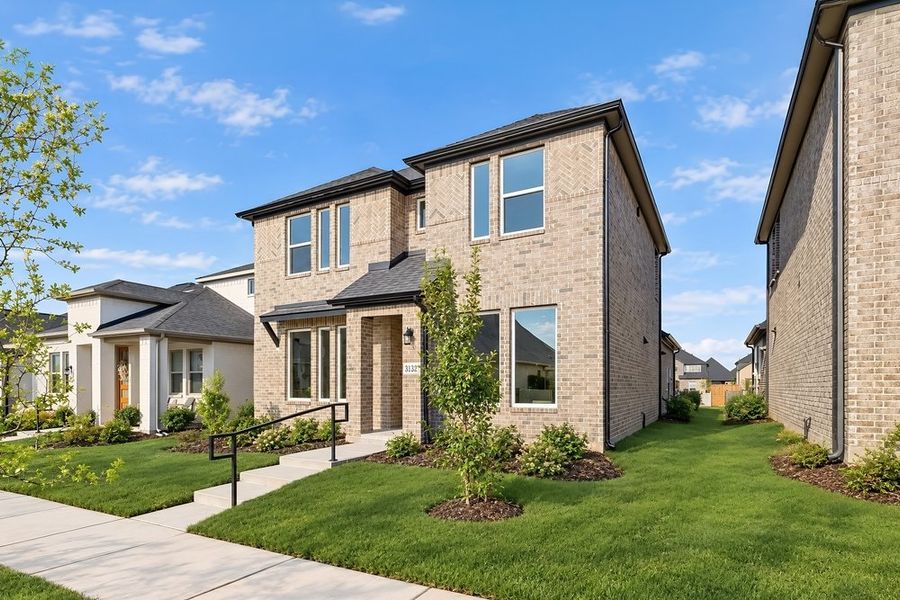 Front exterior of a new home in North Sky Celina, Celina, TX, highlighting curb appeal (Image 16). Front exterior of a new home in North Sky Celina, Celina, TX, highlighting curb appeal (Image 16).
