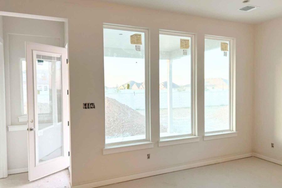 Doorway to outside featuring carpet floors