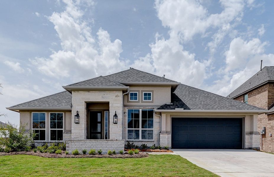 Front exterior of a new home in Bridgeland 60′, Cypress, TX, highlighting curb appeal (Image 1). Front exterior of a new home in Bridgeland 60′, Cypress, TX, highlighting curb appeal (Image 1).