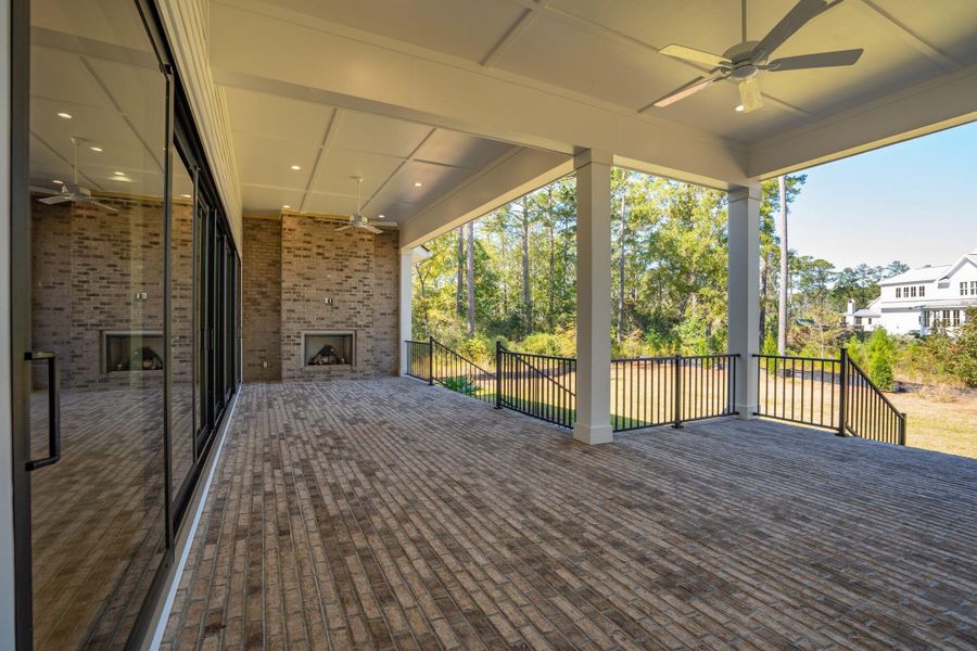 Exterior details and patio area of a home in , Ravenel (Image 37).