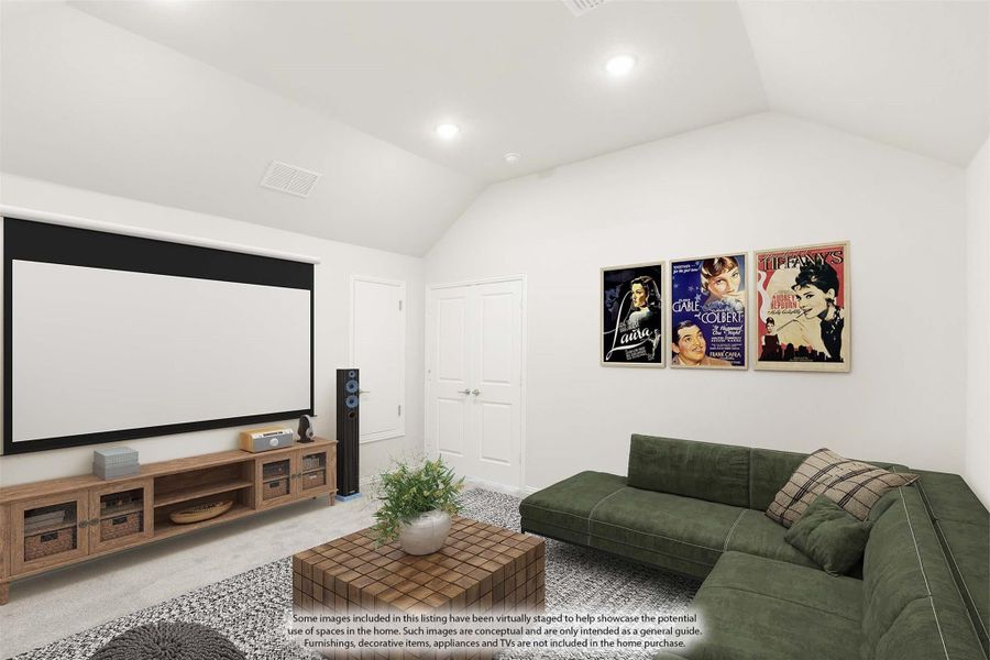 Media room with large projection screen, green sectional sofa, and movie posters on the wall