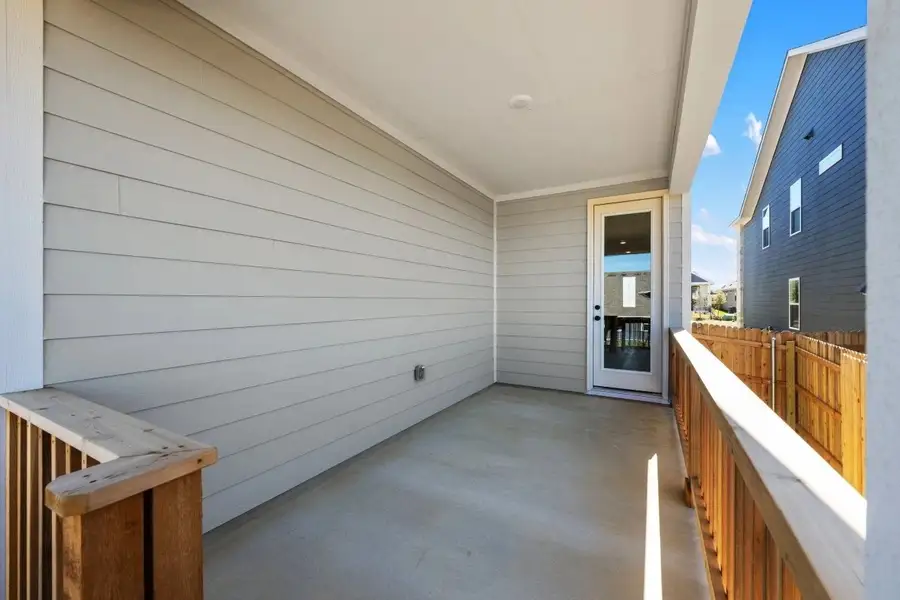 Exterior details and patio area of a home in Cannon Ranch, Dripping Springs (Image 4).