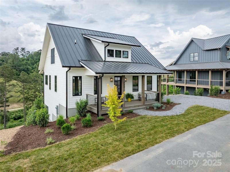 Front exterior of a new home in , Asheville, NC, highlighting curb appeal (Image 1). Front exterior of a new home in , Asheville, NC, highlighting curb appeal (Image 1).