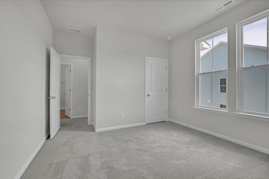 Spacious, unfurnished interior of a new home in Grand Park, Leland (Image 25).
