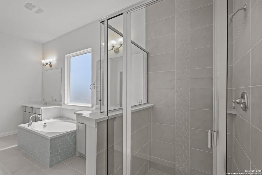 Furnished interior view inside a new home in Homestead 65', Schertz (Image 9).