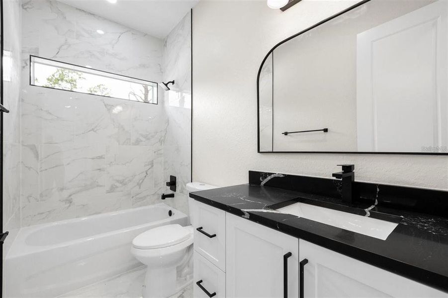 Furnished interior view inside a new home in , Dunnellon (Image 6).