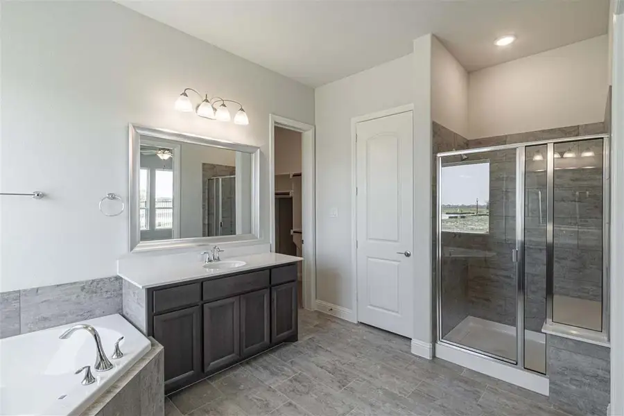 Representative furnished interior of a home built from the Brennan by Pacesetter Homes in Timberbrook, Justin (Image 7).