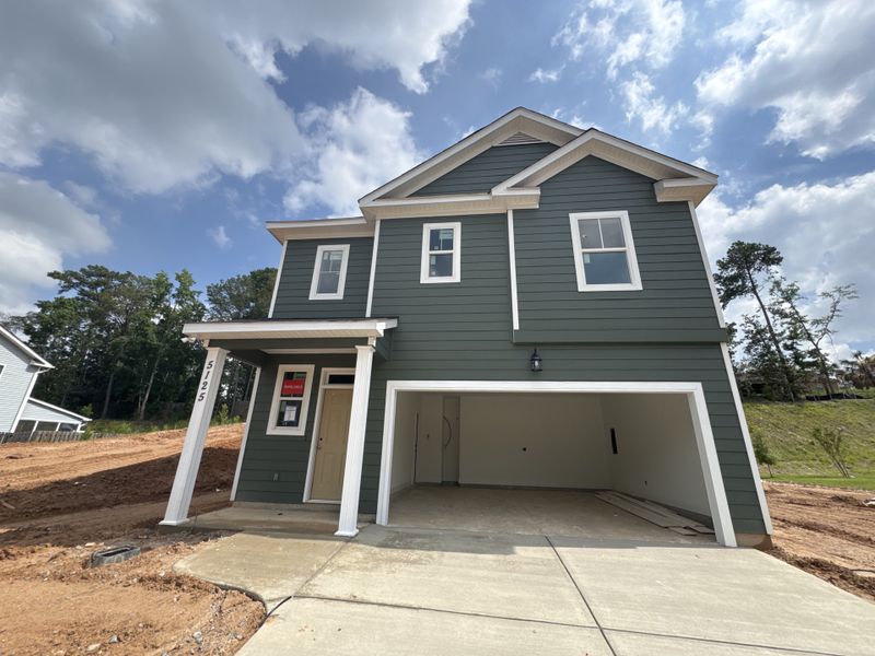 Front exterior of a new home in Forrest Bluff, North Augusta, SC, highlighting curb appeal (Image 2). Front exterior of a new home in Forrest Bluff, North Augusta, SC, highlighting curb appeal (Image 2).