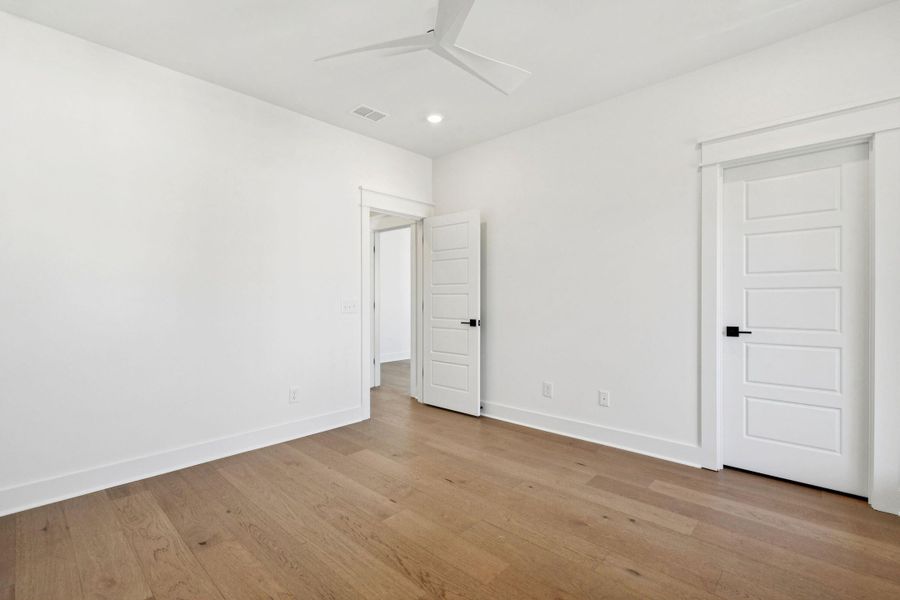 Spacious, unfurnished interior of a new home in Overlook at Copahee Sound, Awendaw (Image 75).