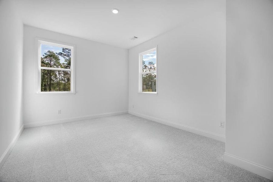 Spacious, unfurnished interior of a new home in Bailey Fence, Dacula (Image 30).
