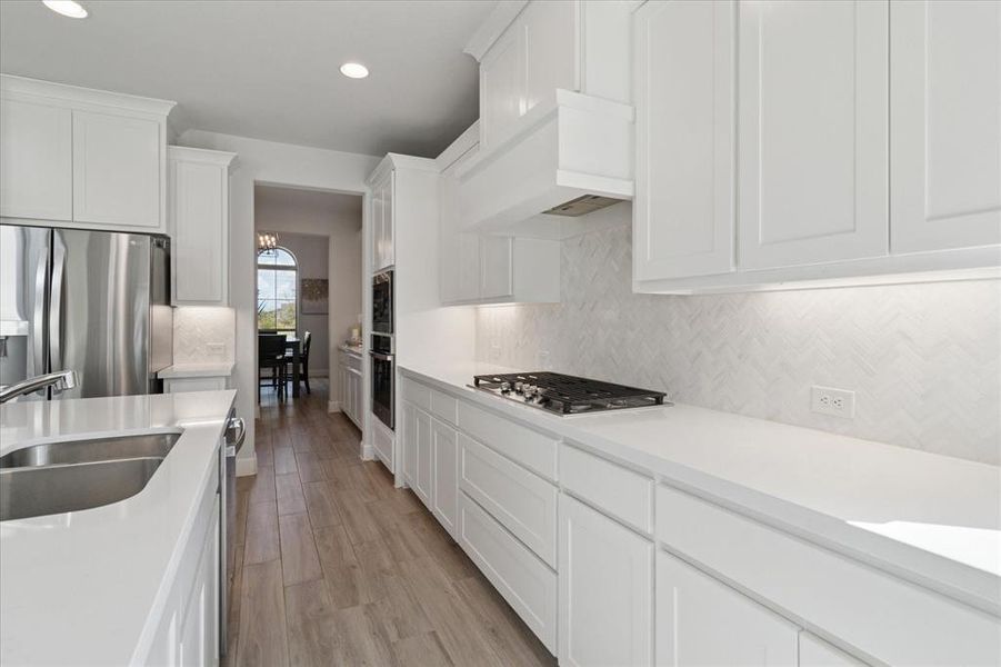 Furnished interior view inside a new home in , Little Elm (Image 10).