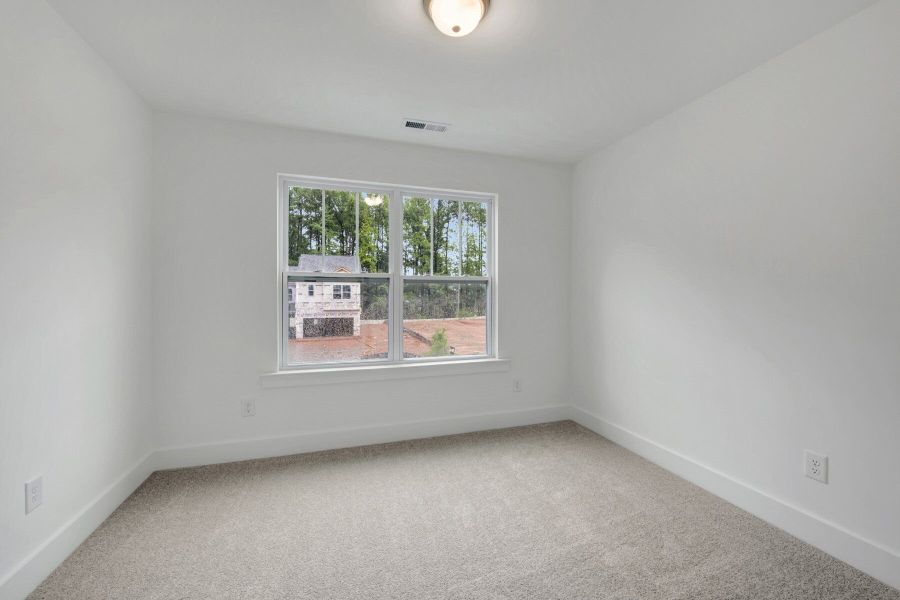 Spacious, unfurnished interior of a new home in Ashmore Townes, Garner (Image 10).
