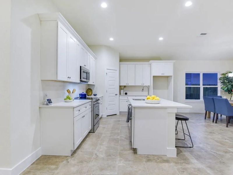Representative furnished interior of a home built from the The Summerville 50's by AHA Dream Homes, LLC in Whisper Valley, Manor (Image 22). Representative furnished interior of a home built from the The Summerville 50's by AHA Dream Homes, LLC in Whisper Valley, Manor (Image 22).
