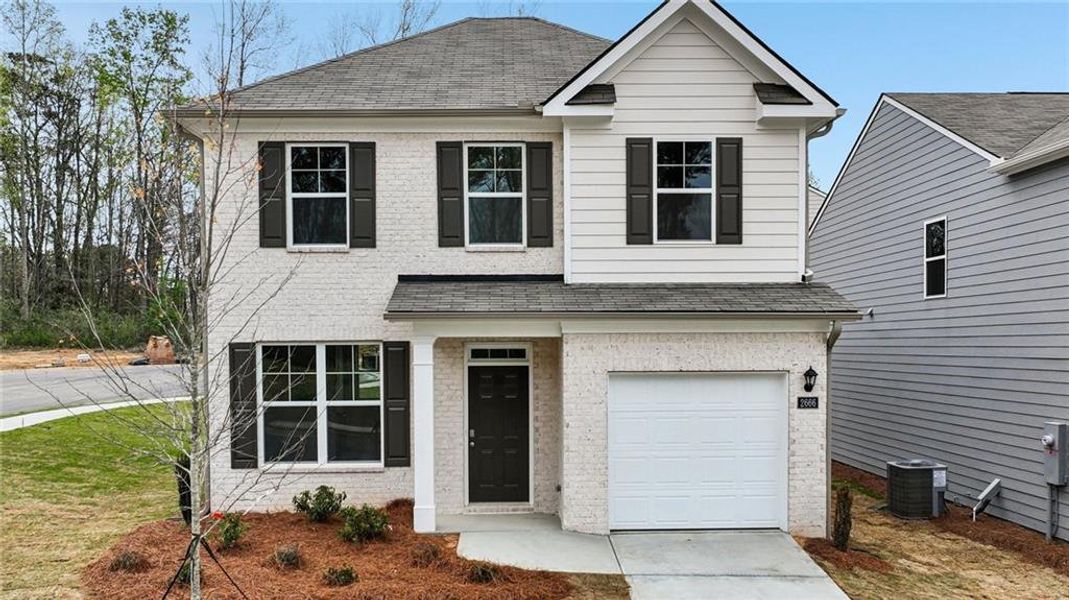 Front exterior of a new home in Sherwood Manor, College Park, GA, highlighting curb appeal (Image 18).