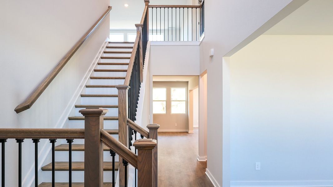 Representative unfurnished interior of a home built from the STONEBROOK II by D.R. Horton in Harvest Point, Spring Hill (Image 26).