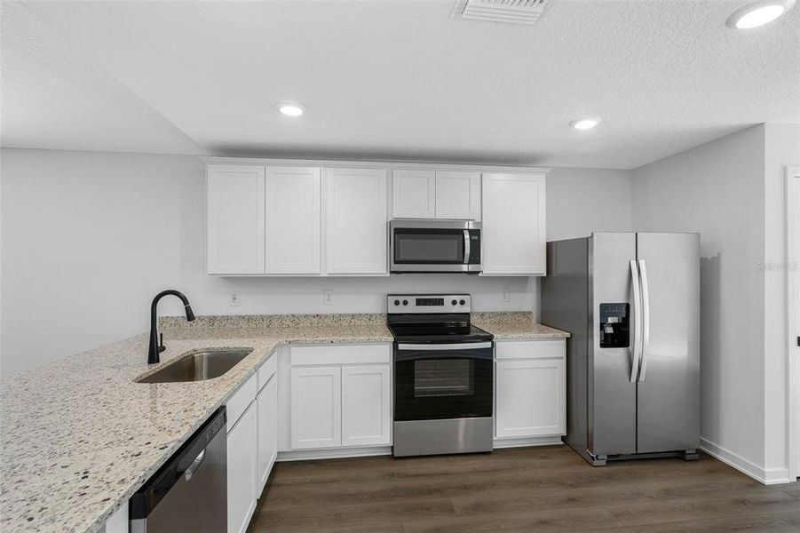 Furnished interior view inside a new home in Spring Hill, Spring Hill (Image 4).