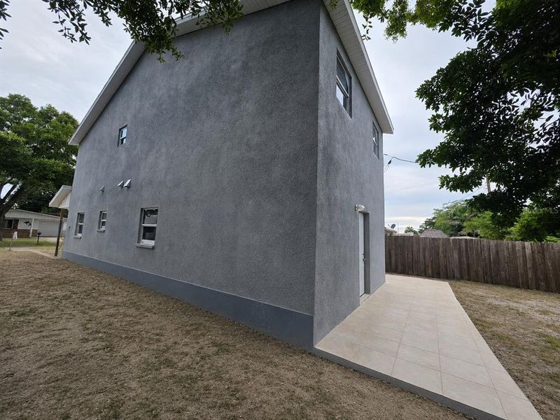 Exterior details and patio area of a home in , Holiday (Image 3).
