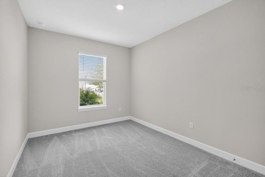 Spacious, unfurnished interior of a new home in Esplanade at Wiregrass Ranch, Wesley Chapel (Image 30).