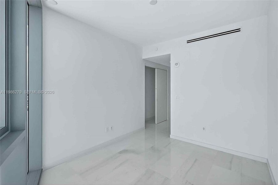 Spacious, unfurnished interior of a new home in Aston Martin Residences, Miami (Image 24). Spacious, unfurnished interior of a new home in Aston Martin Residences, Miami (Image 24).