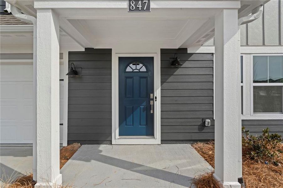 Exterior details and patio area of a home in Twin Lakes, Hoschton (Image 4).