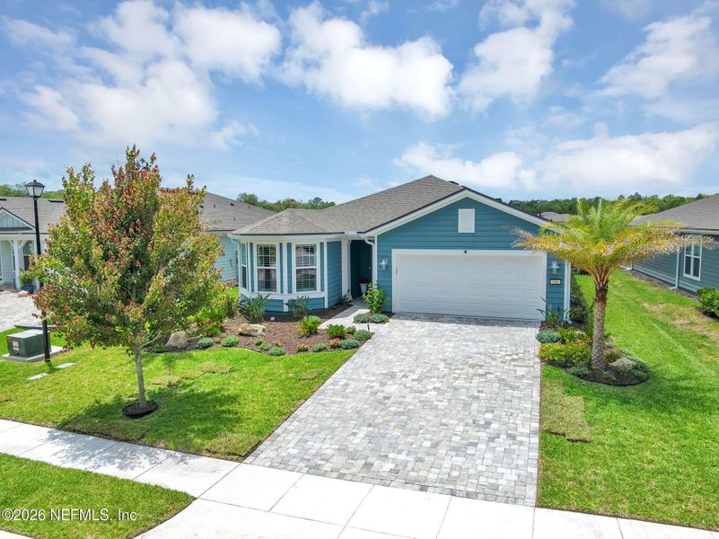 Front exterior of a new home in , Ponte Vedra, FL, highlighting curb appeal (Image 27).