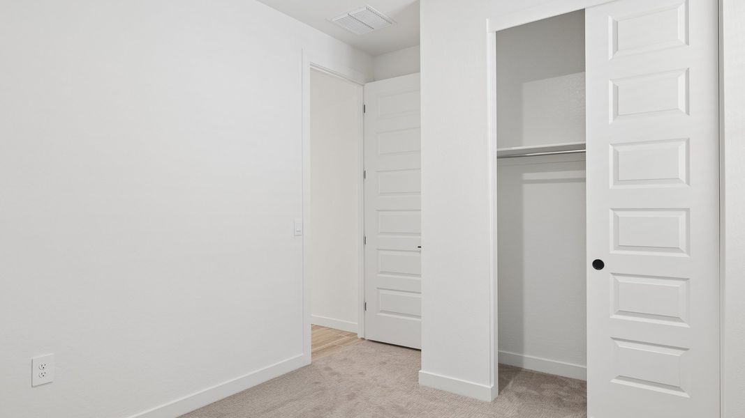 Spacious, unfurnished interior of a new home in The Ridge at Stone Butte, Phoenix (Image 23).