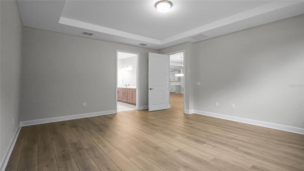 Spacious, unfurnished interior of a new home in Cresswind at Hammock Oaks, Lady Lake (Image 34). Spacious, unfurnished interior of a new home in Cresswind at Hammock Oaks, Lady Lake (Image 34).