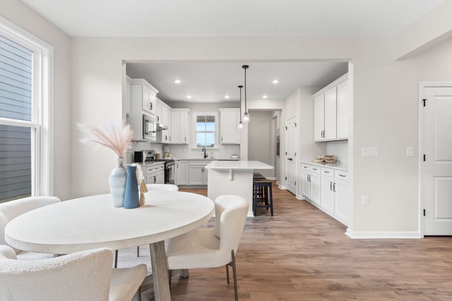 Stunning Open Layout for Kitchen, Gathering Space & Dining Area