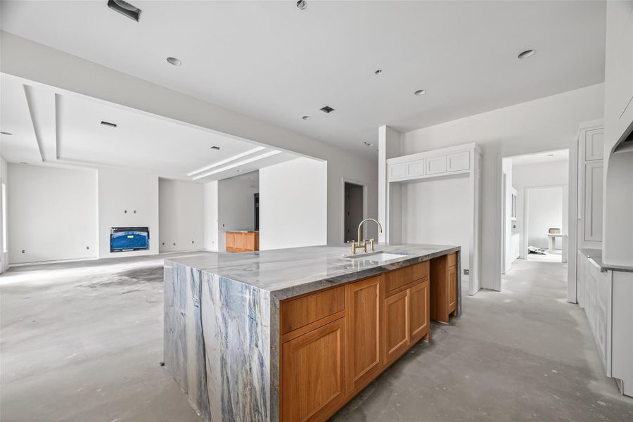 Another view of the kitchen looking towards the large living room