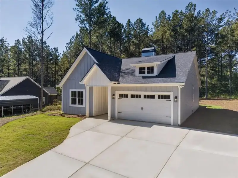 Front exterior of a new home in , Dallas, GA, highlighting curb appeal (Image 1). Front exterior of a new home in , Dallas, GA, highlighting curb appeal (Image 1).