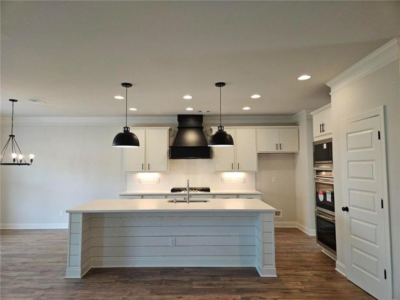 Furnished interior view inside a new home in Calgary Downs, Winder (Image 3).