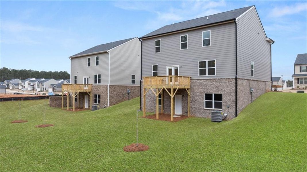 Exterior details and patio area of a home in The Reserve at Calcutta, Stockbridge (Image 4).