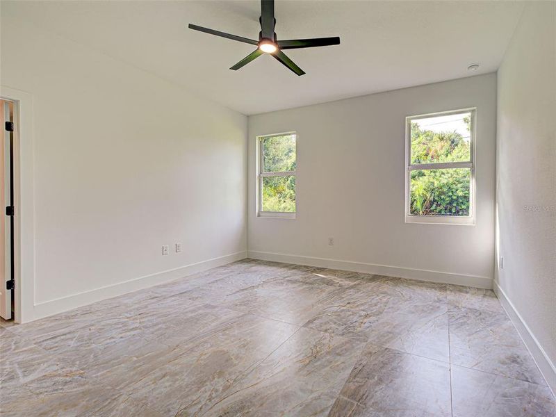 Spacious, unfurnished interior of a new home in , Port Charlotte (Image 36).