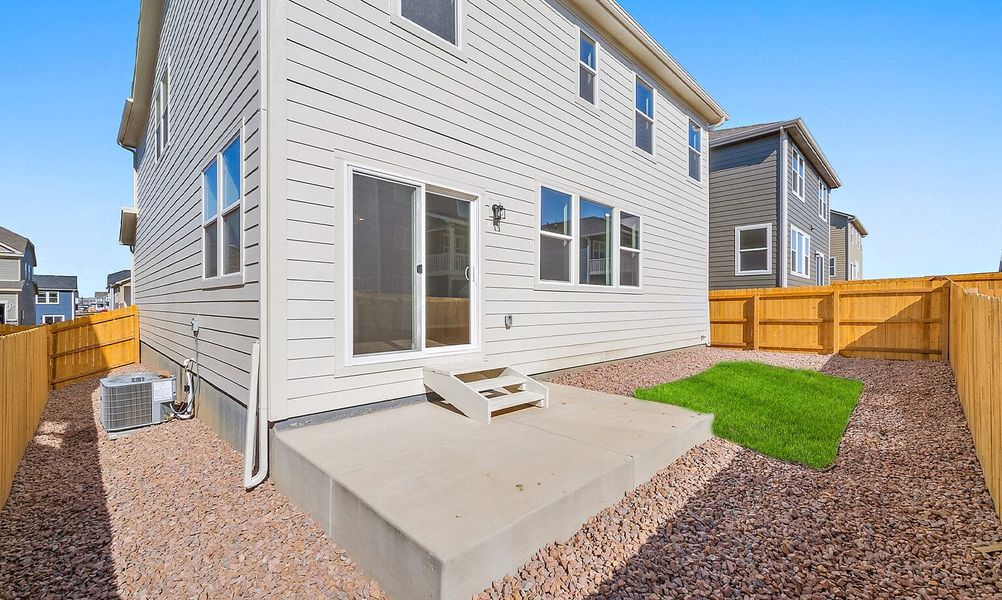 Exterior details and patio area of a home in Ridge at Lorson Ranch, Colorado Springs (Image 18).