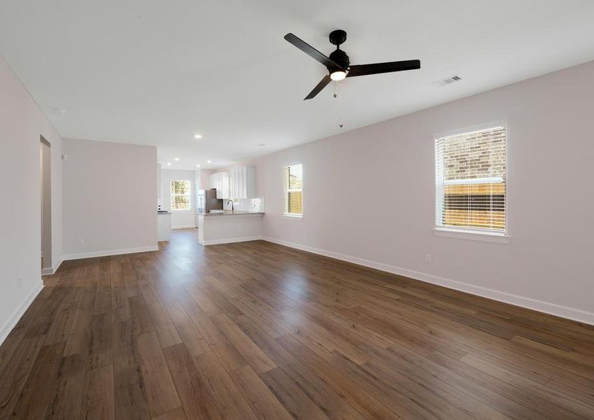 Spacious family room looking into the dining room