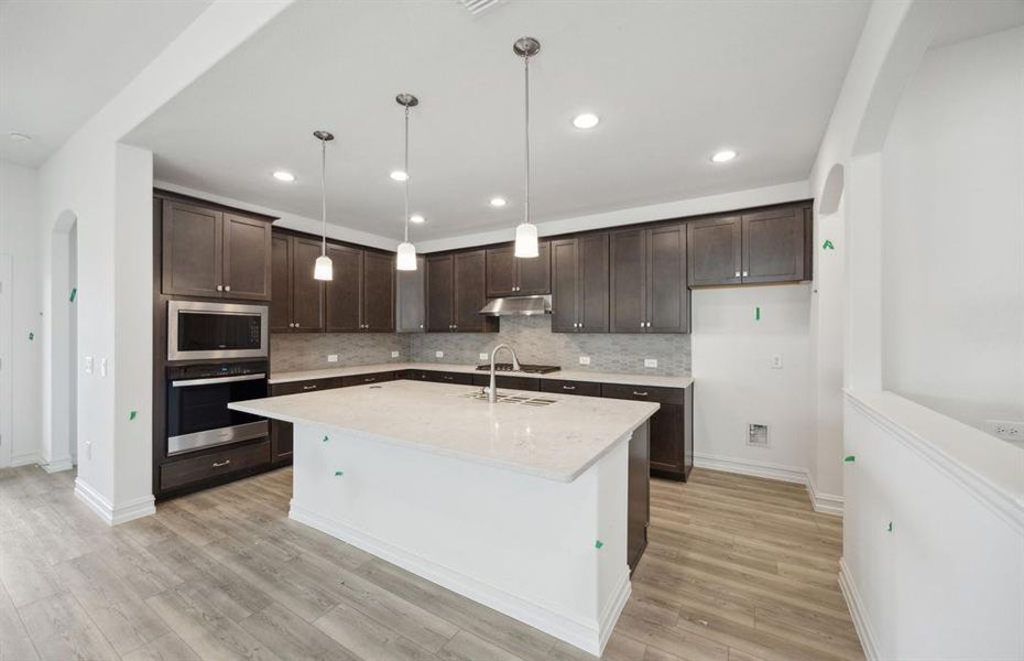 Airy kitchen with ample cabinet space *real home pictured