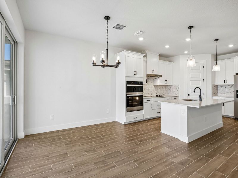Furnished interior view inside a new home in Magnolia Bay - Reserve Series, Nokomis (Image 8).