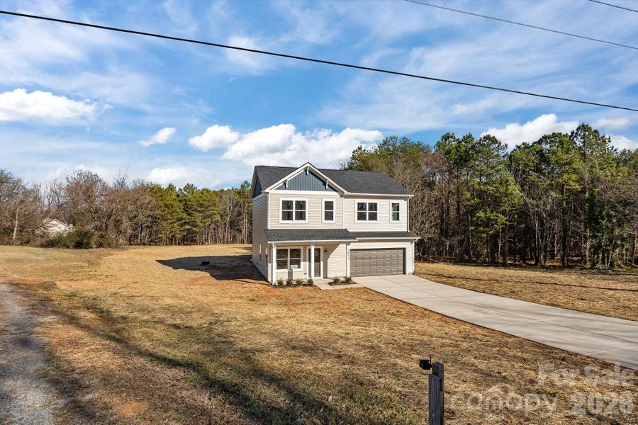 Front exterior of a new home in , Lincolnton, NC, highlighting curb appeal (Image 30).
