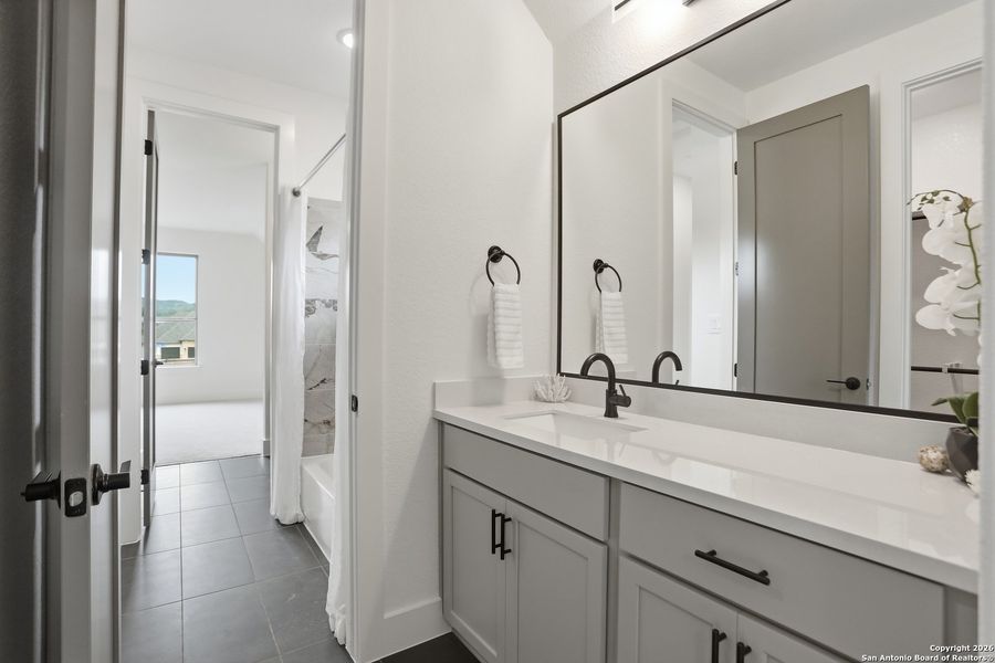 Furnished interior view inside a new home in Kinder Ranch - 70', San Antonio (Image 12).