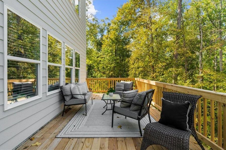 Exterior details and patio area of a home in River Rock, Ball Ground (Image 2).