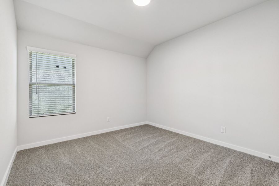 Bedroom in the Oscar home plan by Trophy Signature Homes – REPRESENTATIVE PHOTO Bedroom in the Oscar home plan by Trophy Signature Homes – REPRESENTATIVE PHOTO