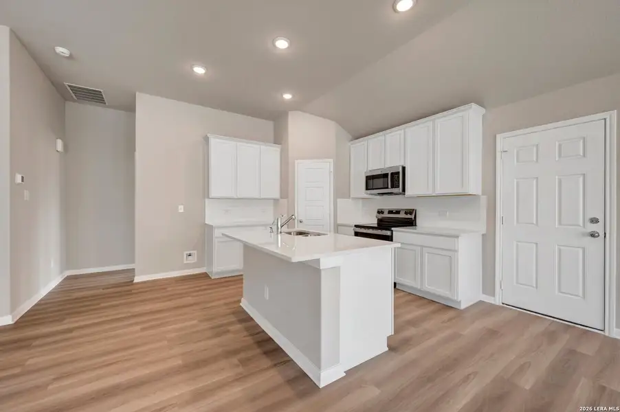 Furnished interior view inside a new home in Greenspoint Heights, Seguin (Image 6).